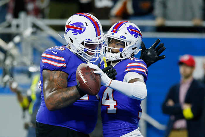 Bills teammates Dion Dawkins and Stefon Diggs celebrate a Diggs touchdown against the Browns